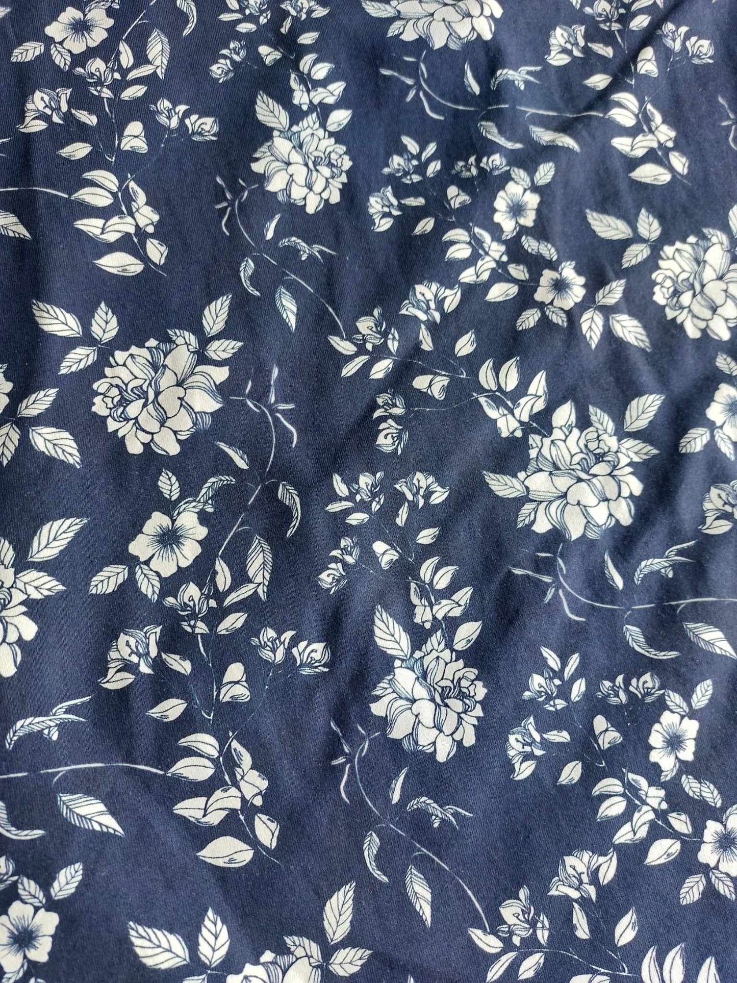 White flowers on navy CL